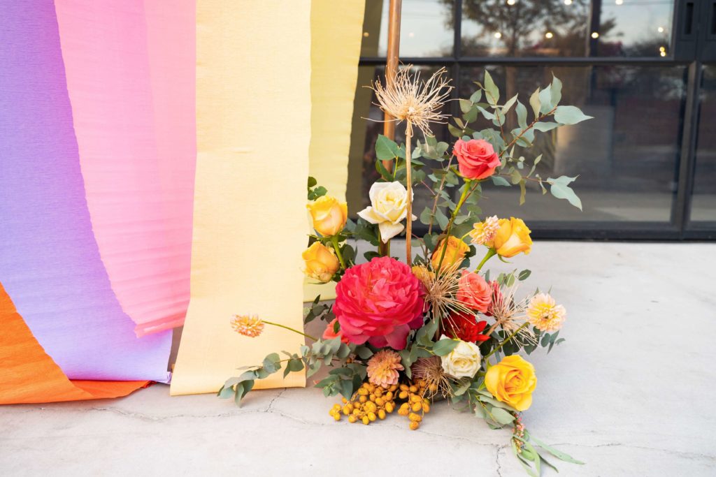 Colorful and organic florals for wedding ceremony