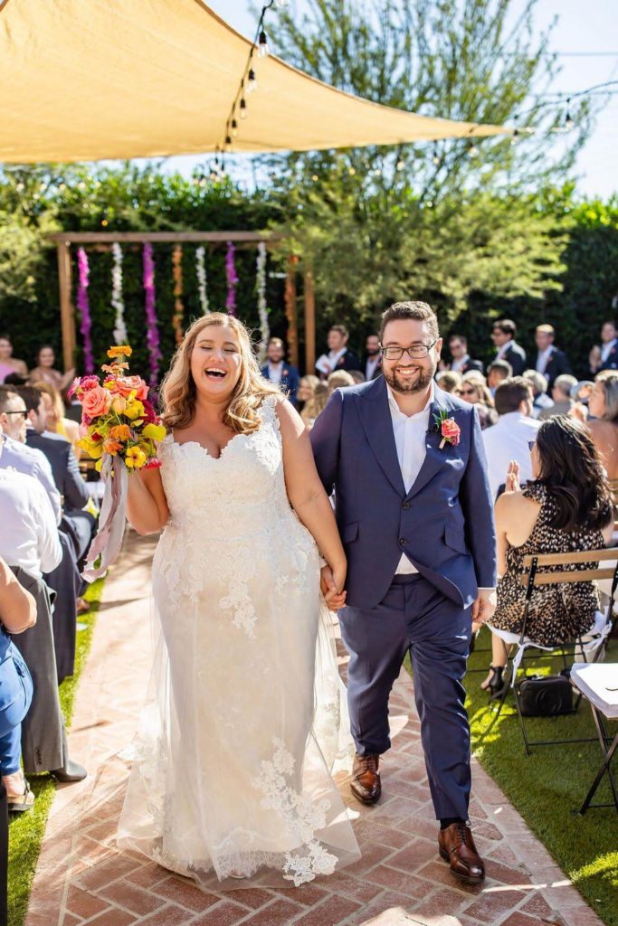 Colorful summer wedding ceremony bride and groom at The Ruby Street Los Angeles