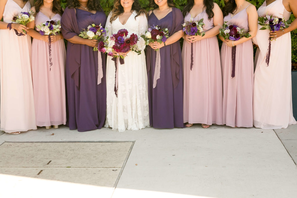 Bridesmaids with purple and mauve dresses at The Fig House Los Angeles
