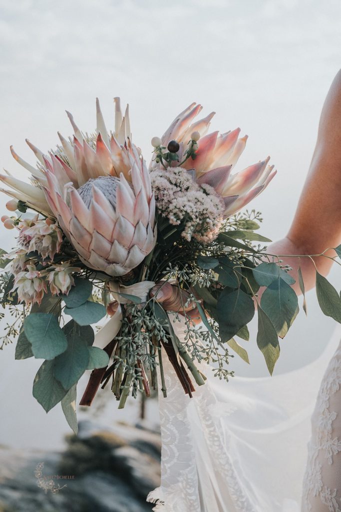 Pink King Protea bouquet with eucalyptus.