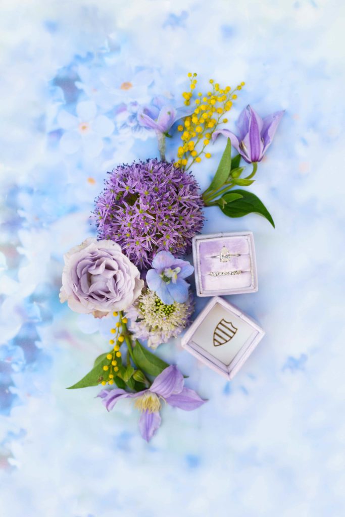 Lavender velvet ring box with light blue and purple flowers