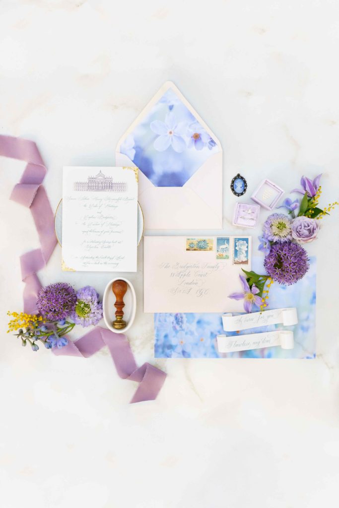 Spring wedding invitation sweet with light blue and purple colors