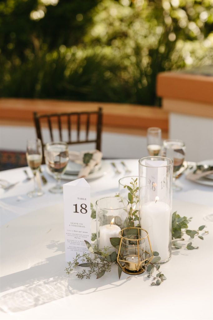 Simple wedding centerpiece with greenery