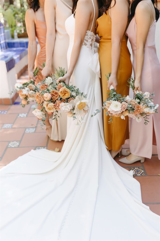 Photo of bridesmaids and bride holding bouquets for Rancho Las Lomas wedding