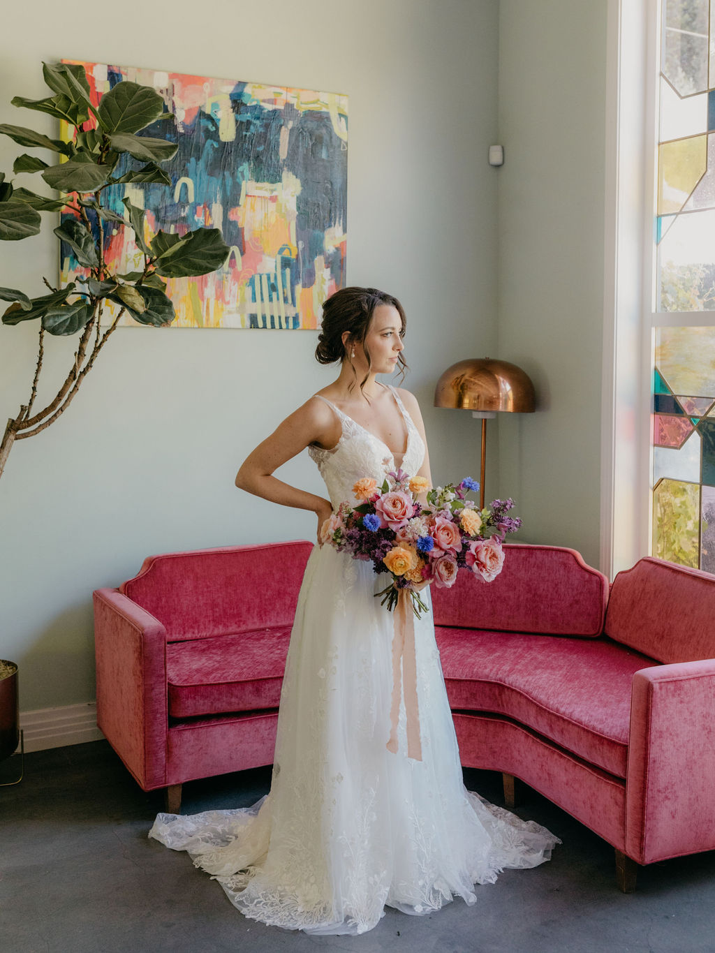 Bride holding a colorful bouquet at contemporary Los Angeles wedding