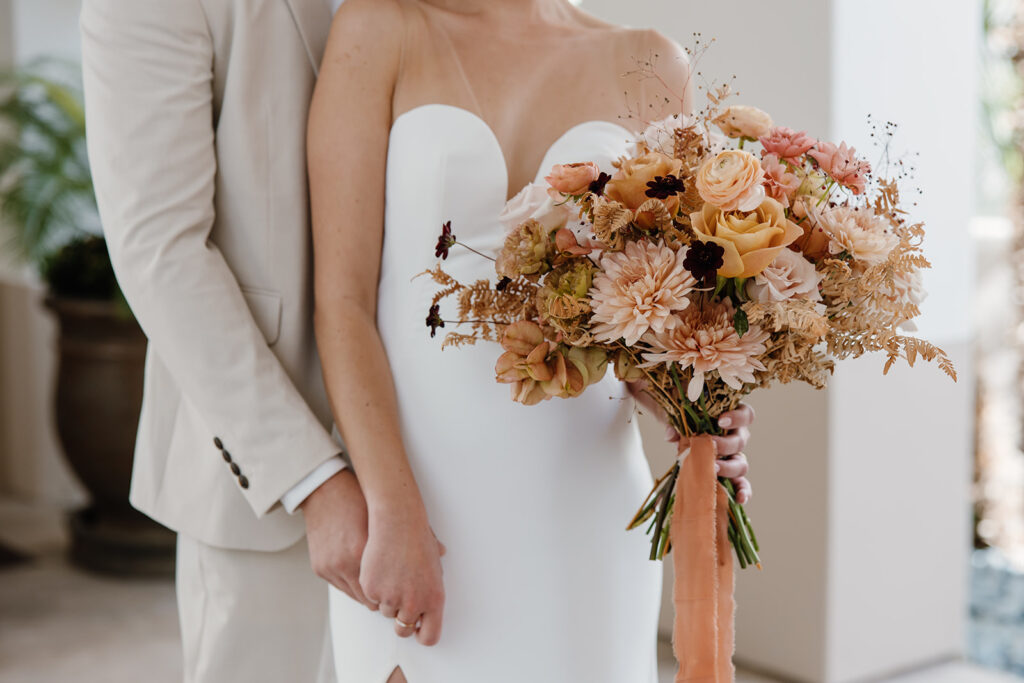 Fall wedding bouquet with gold and blush flowers