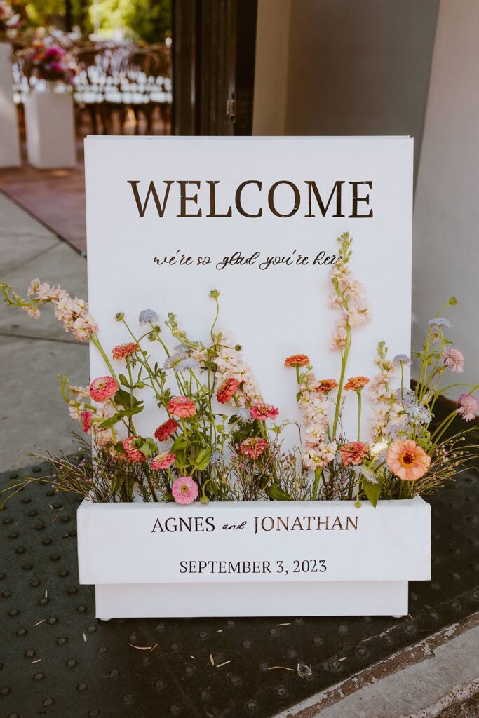 Welcome sign flower box florals