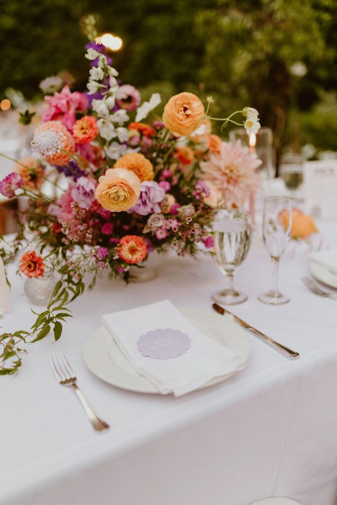 Peach and lavender wedding centerpiece florals
